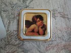 Small Thinking Angel Square Tin, 3" x 3" x 1 3/4", small dent in the lid — photo 1