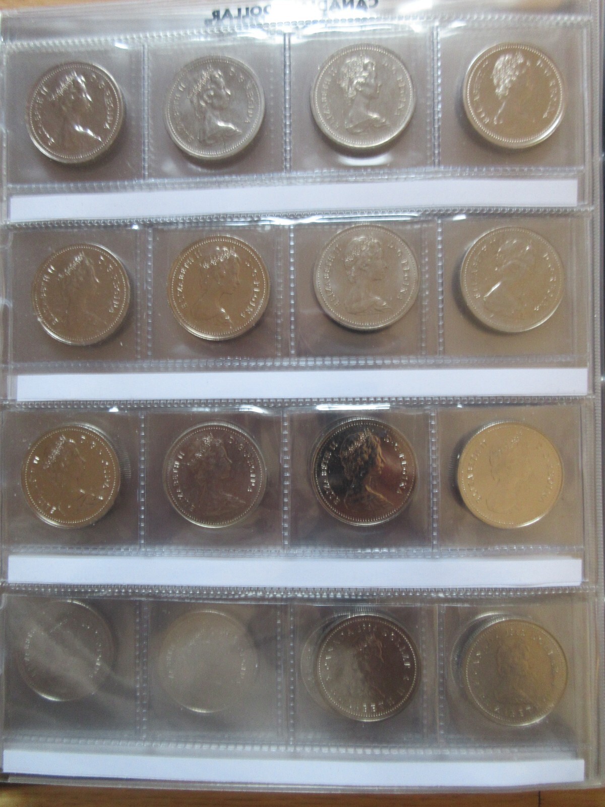 Set of Canada Nickel Dollars Coins Brown UNI-SAFE Album 1968-1986. UNC Coins