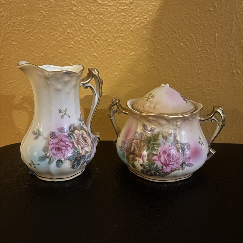 antique early-1900s German porcelain creamer and lidded sugar bowl set