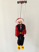 marionnette clown à fil sur sa balançoire tête porcelaine couleur bleu et blanc 