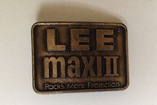LEE Maxi II Packs More Protection Brass Belt Buckle Advertisement