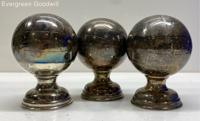 Three Decorative Silver Plate Spheres on Pedestals