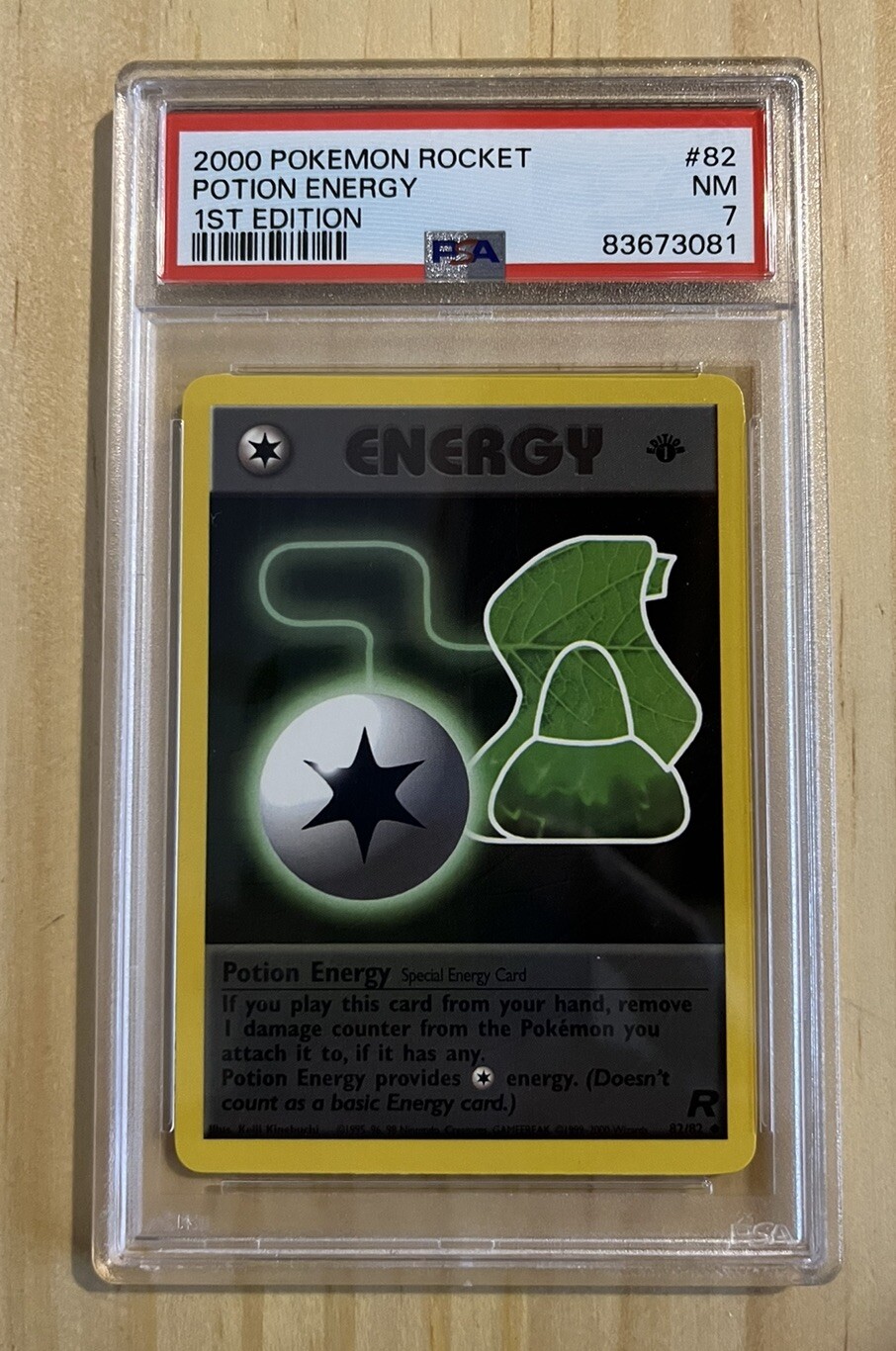 Pokemon - WOTC - Team Rocket - 1st Edition Potion Energy 82/82 PSA 7 NM