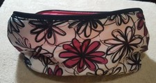 FLOWERED COSMETIC BAG 10 4.5 AND 6 INCHES DEEP WHITE WITH PINK AND BLACK FLOWERS