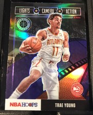 19-20 NBA Hoops Premium Stock Lights Camera Action #22 Trae Young PURPLE PRIZM