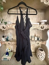 Strappy little black dress with ruffles small