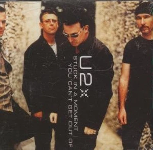 U2 Stuck In A Moment You Can't Get Out of CD UK Island 2000 brown sleeve design - Bild 1 von 1
