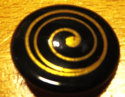 BOUTON PORCELAINE émaillée SPIRALE dorée ø: 24 mm - Photo 1/2