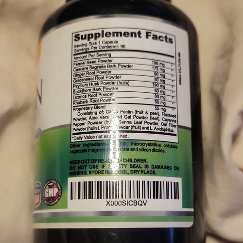 White alohaGenix Colon Complex supplement label with green and white text, dosage information, and barcode.