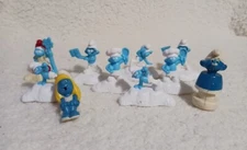 Lot Of 10  Assorted Smurfs Figures Including Lost Village Toys figurines.