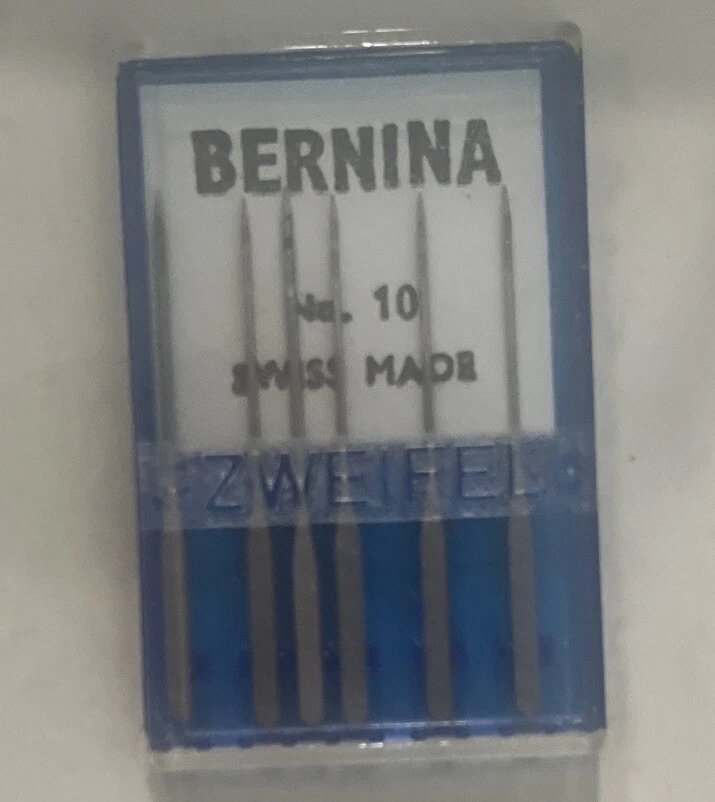 Caja de accesorios Bernina y agujas de coser diversas Foto 3 de 4