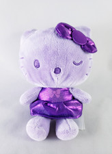 Peluche Sanrio Just Play Hello Kitty todo púrpura guiñando un ojo