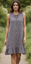 MICHAEL KORS BLACK WHITE FLORAL TIE FRONT RUFFLED HEM DRESS Size Small Travel