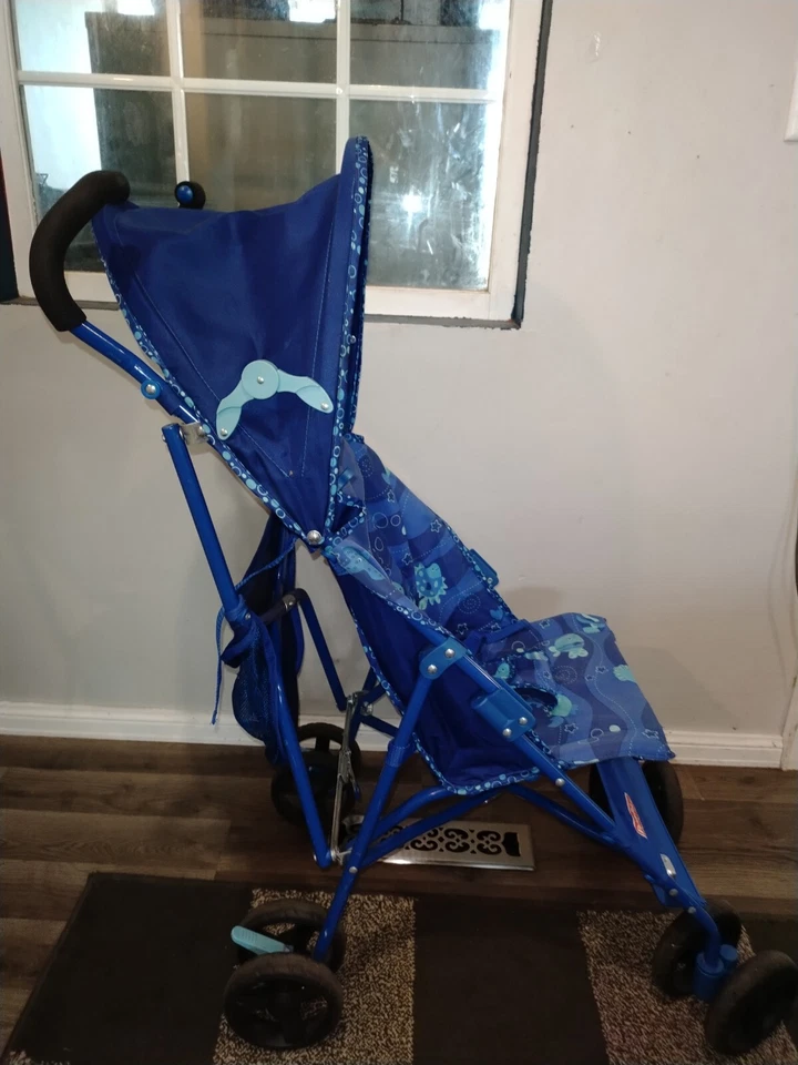 Cochecito ligero Fisher Price Ocean Wonder de colección difícil de encontrar raro acuario Foto 4 de 4