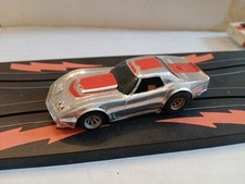 Aurora AFX MagnaTraction AP Corvette Chrome/Red Slot Car