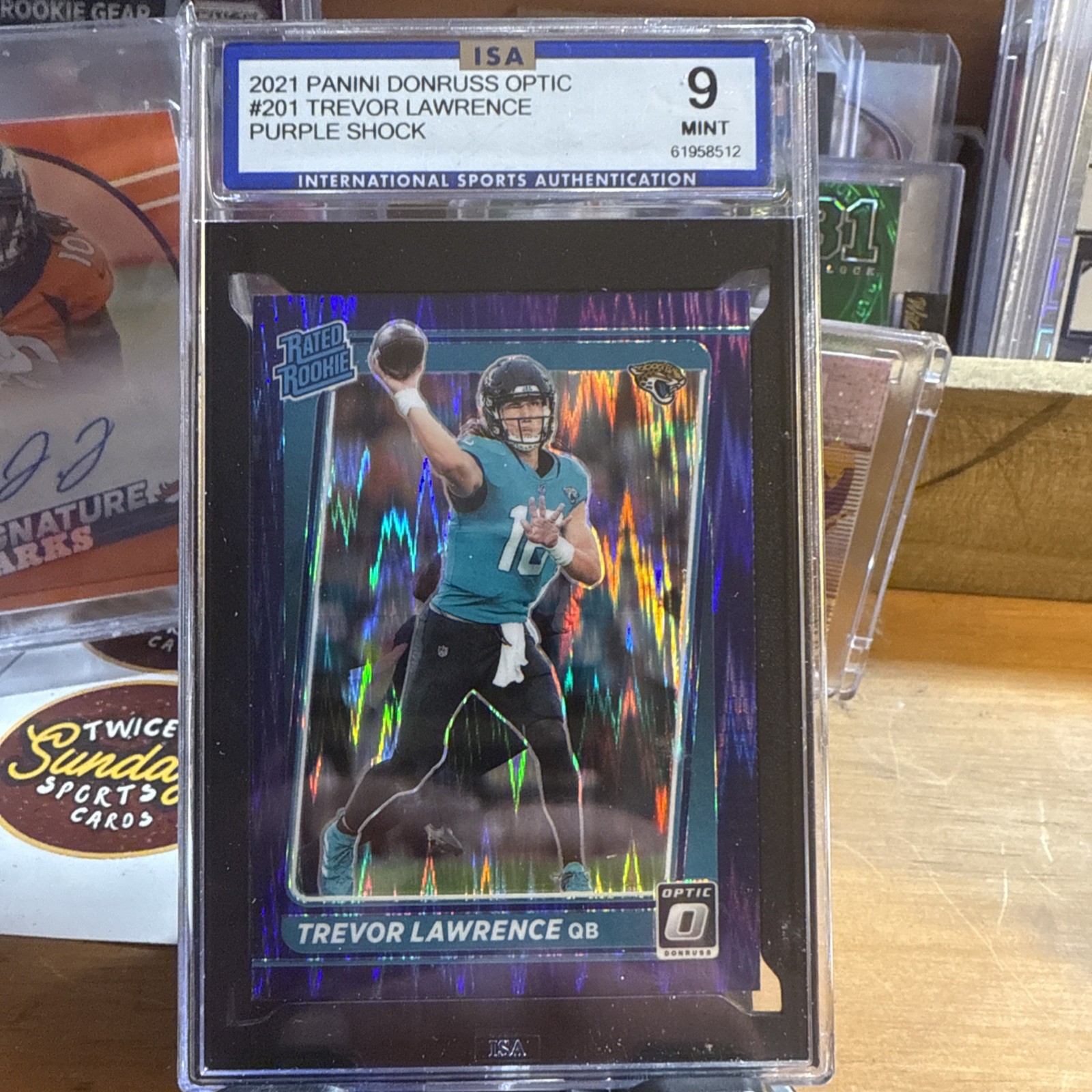 2021 Donruss Optic Trevor Lawrence Purple Shock RC Rated Rookie #201 PSA 9