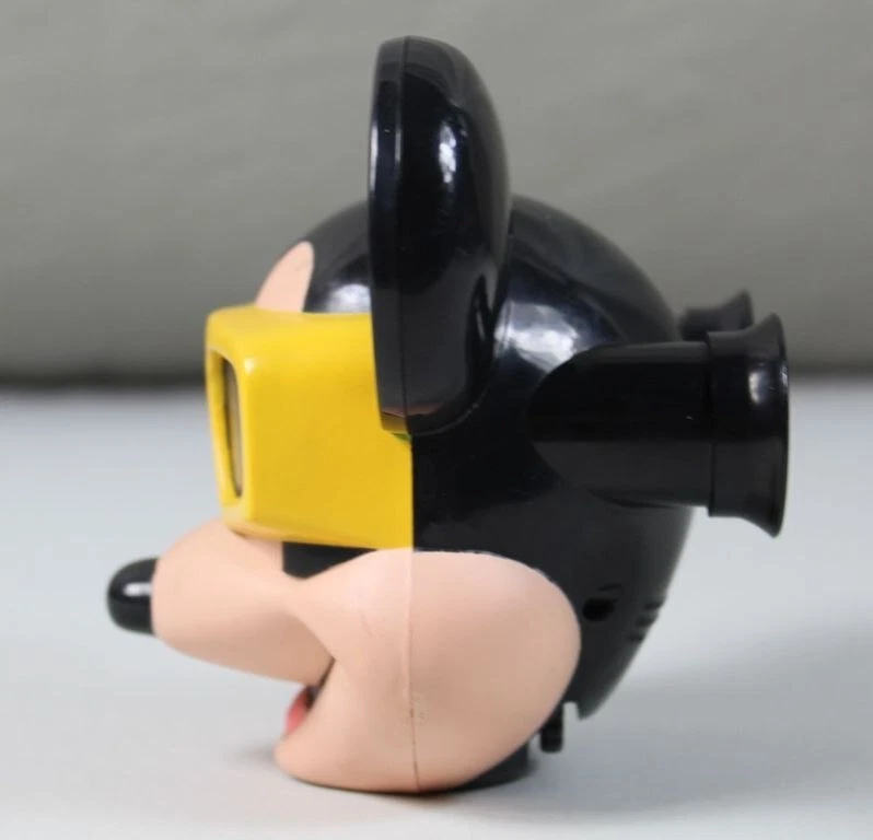 kleines Plastiskop - Micky Mouse Kopf mit 7 Ansichten - Disneyland Paris /S310 - Bild 3 von 4