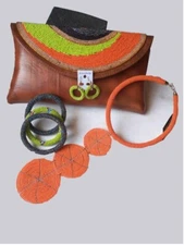 Leather clutch purse decorated with colorful beads with matching necklace, brace