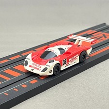 AFX Denso Tom's 89C-V Toyota Red White Turbo Chasis HO Slot Car Tomy In stock