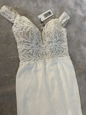 Louvienne Fellon LV021 Off-the-shoulder gown with a fitted crepe skirt and train