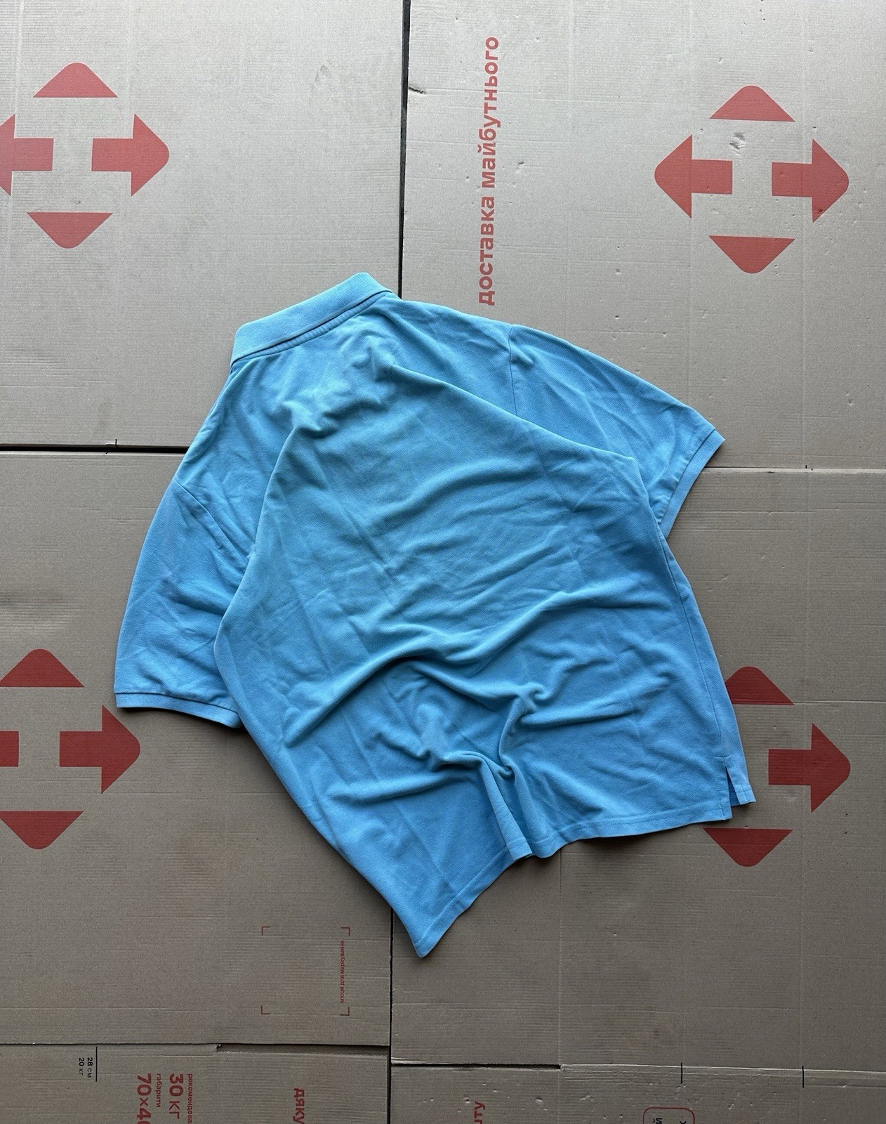 Polo Yves Saint Laurent L blu con logo ricamato YSL