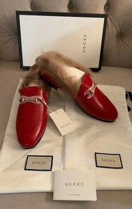 red gucci fur loafers