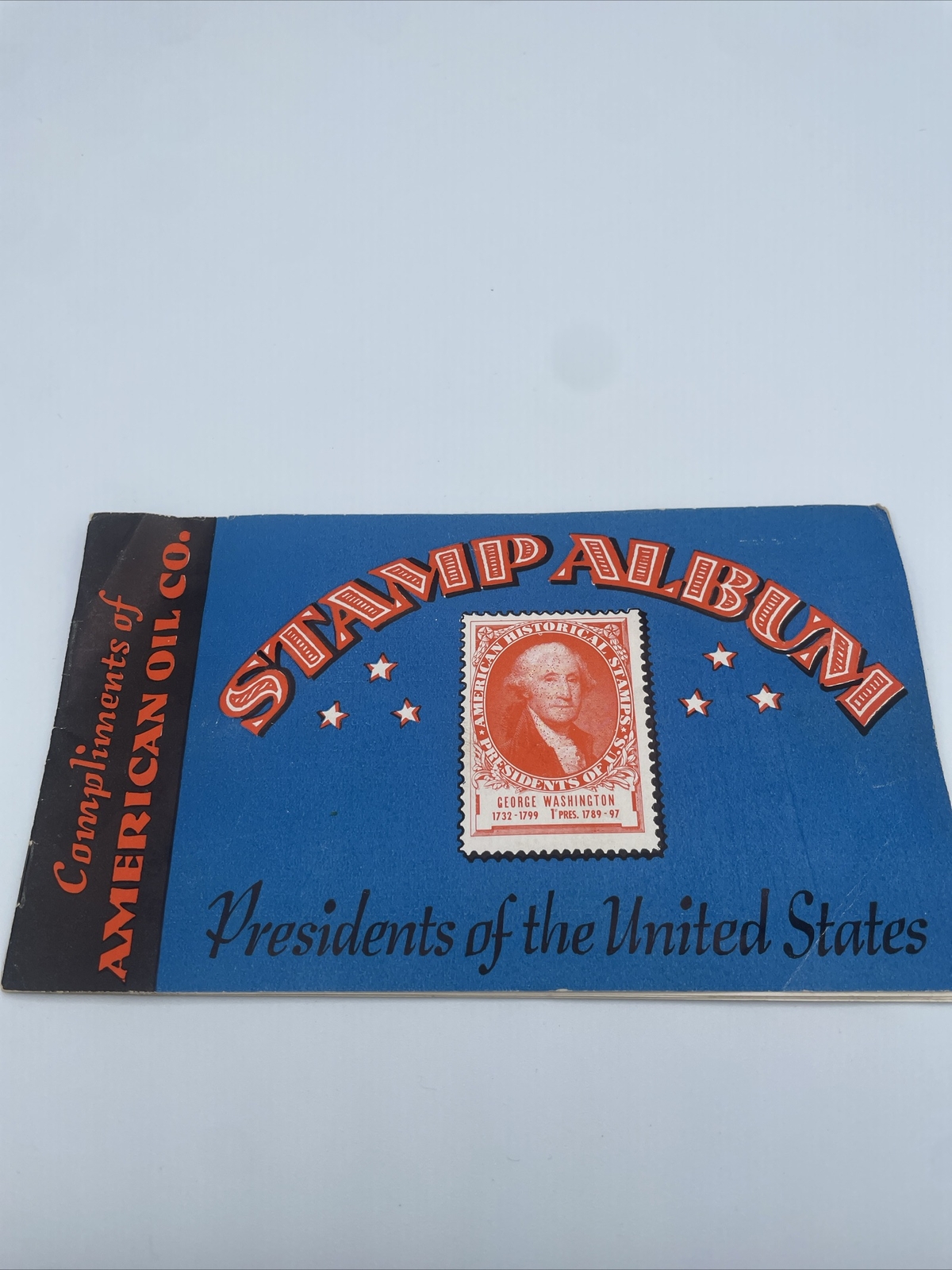 1936 AMOCO PRESIDENTIAL STAMP ALBUM W/32 MOUNTED PRESIDENTIAL PORTRAIT STAMPS
