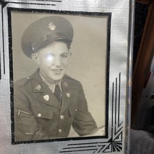 vintage photograph of a soldier in a World War II-era U.S. Army