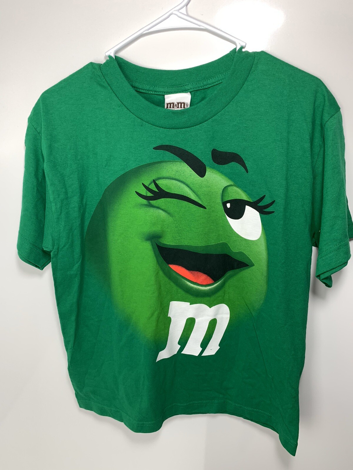 Green M&M TShirt, Lady Winking m&m . Youth Retail Large RA11 eBay