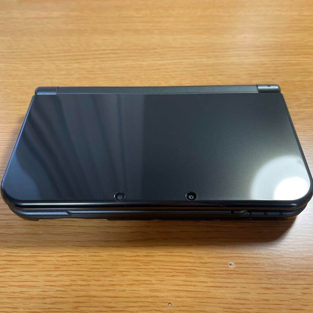 New Nintendo 3DS XL LL Metallic Black Console Stylus Working New Nintendo 3DS XL LL Metallic Black Console Stylus Working