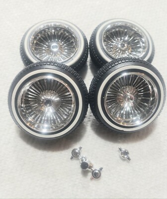 1/18 scale  chrome wire rims with white wall tires and  2 prong knock offs