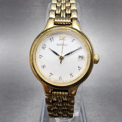 Seiko Watch Women 23mm White Dial Gold Tone Date Round 7N82-0228 New Battery