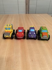 Elegant Baby Set of Four Monster Truck Party Squirtie Baby Bath Toys