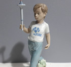 Lladro Figurine 7522 "Courage" Special Olympics Boy With Torch — photo 9