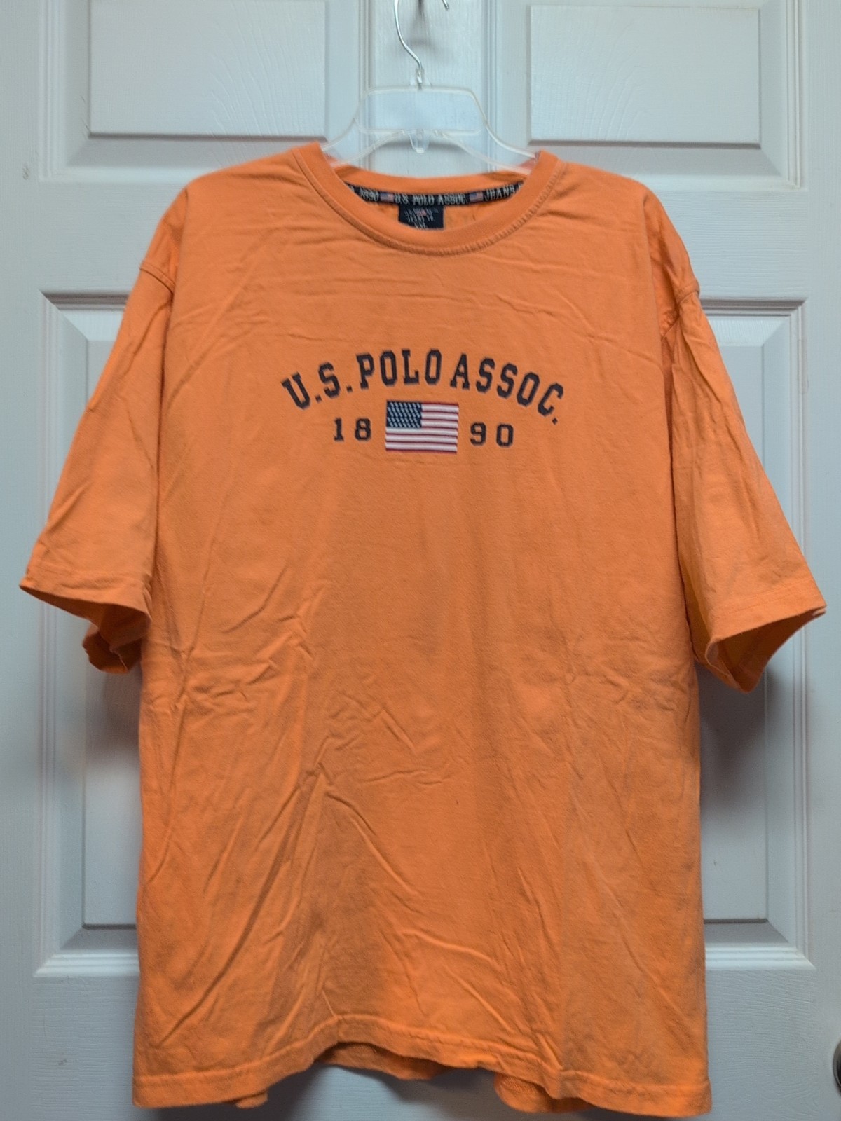 US Polo  Mens  T  Shirt  Size 2X L.  Orange Short Sleeve   Vintage  Flag 