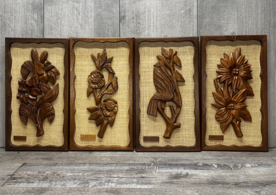 A tactile, three-dimensional set of 4 carved wood and wicker floral panels that bring warmth and handcraft texture to any wall.