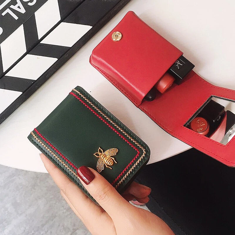 Makeup bag with mirror outlet