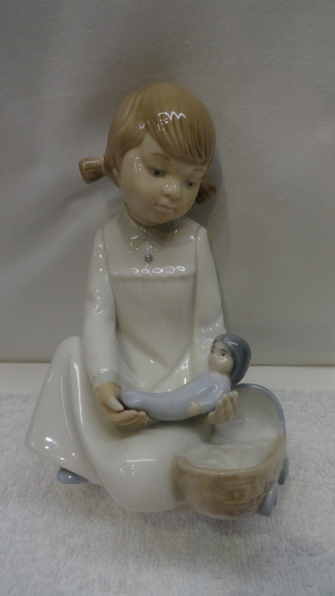 NAO by Lladro 564 Porcelain Figurine, Girl Holding Her Doll With