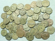 One Authentic Ancient Roman Bronze Coin. 15mm - 20mm.