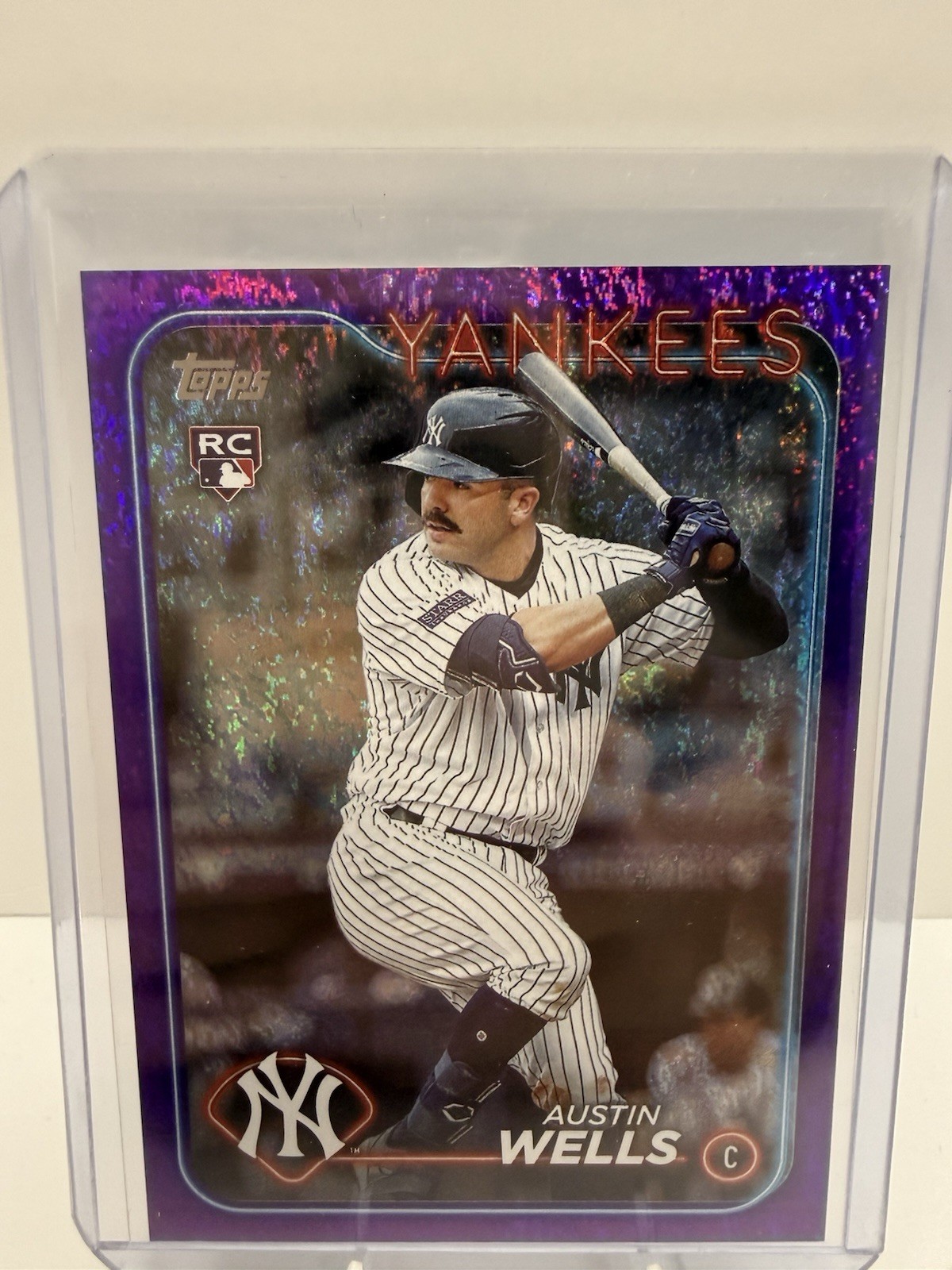 2024 Topps Series 2 - Austin Wells #624 Purple Foil 100/799 (RC)