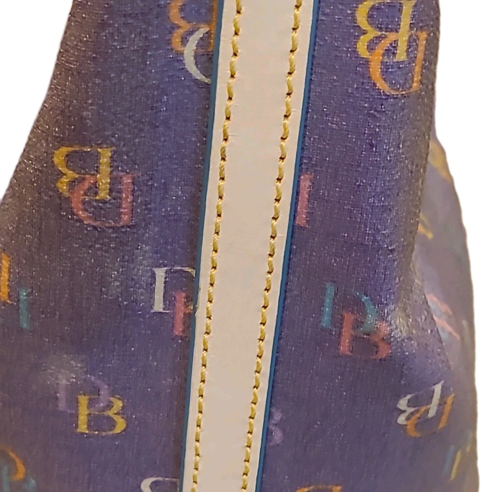 Mini cubo Dooney & Bourke años 2000 en púrpura número de serie H4 261688 Foto 4 de 4