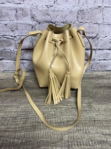 yellow drawstring bolsa