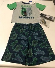 Boys 2 piece dinosaur pajamas with toy NEW size 10 flame resistant retail 30.00