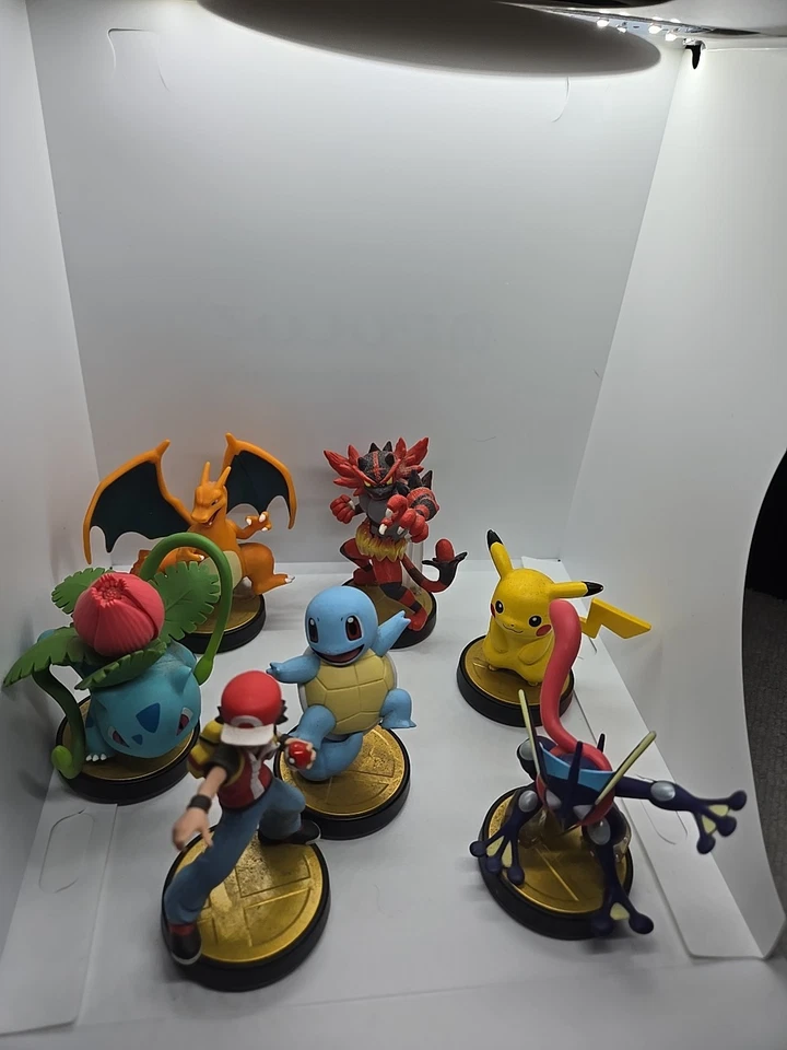 Pokemon Lote De 7 Amiibo Charizard Pikachu Squirtle Greninja Trainor Ivysaur Etc Foto 2 de 4