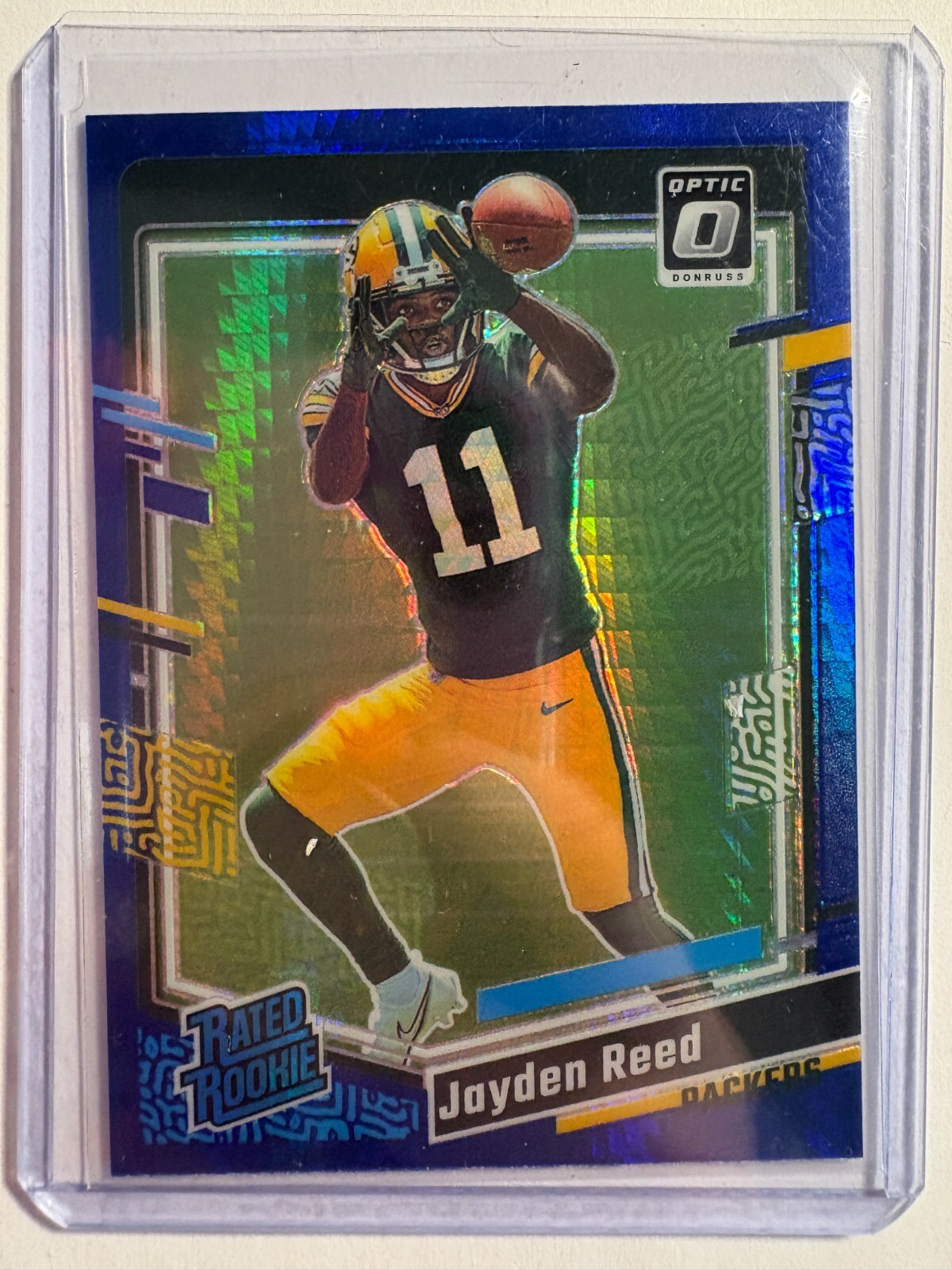 K326,469 - 2023 Donruss Optic Blue Hyper #239 Jayden Reed RR