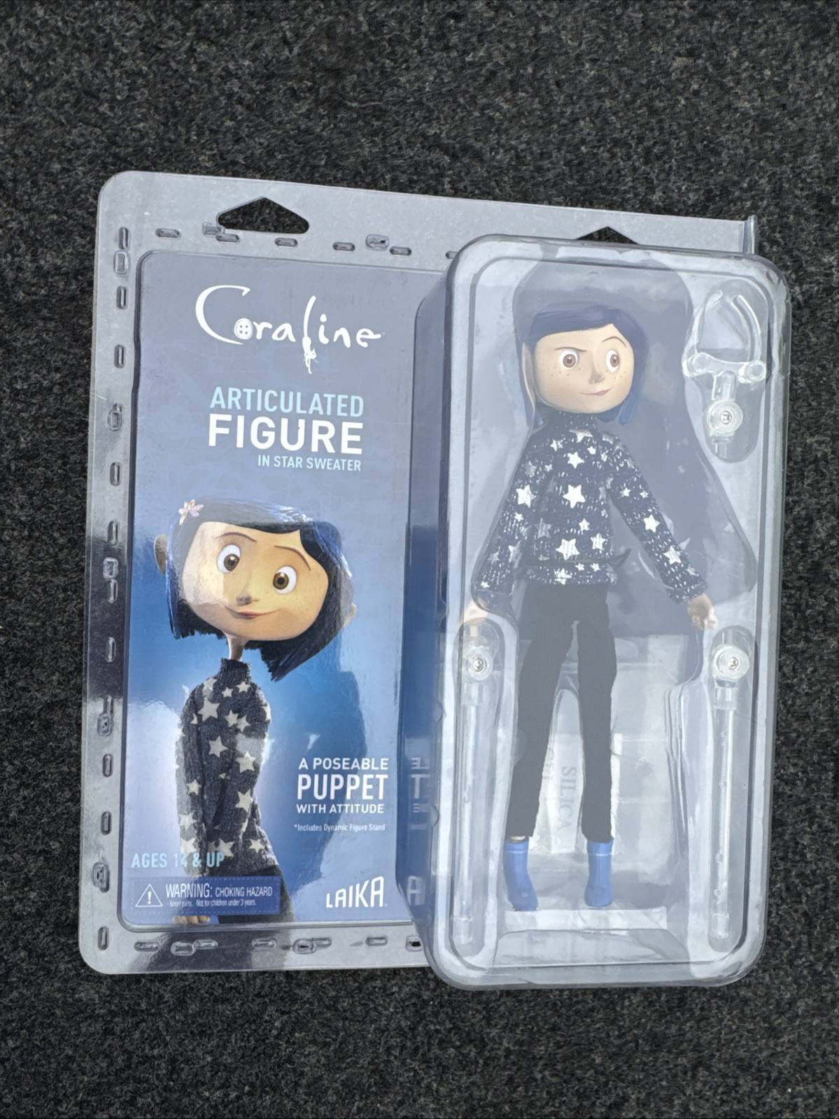 Coraline 7-Inch Fully Articulated Action Figure with Moving Eyes and Display Stand