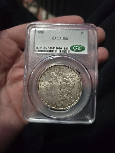 1889 MORGAN "CAC AU58" - Tone Starting