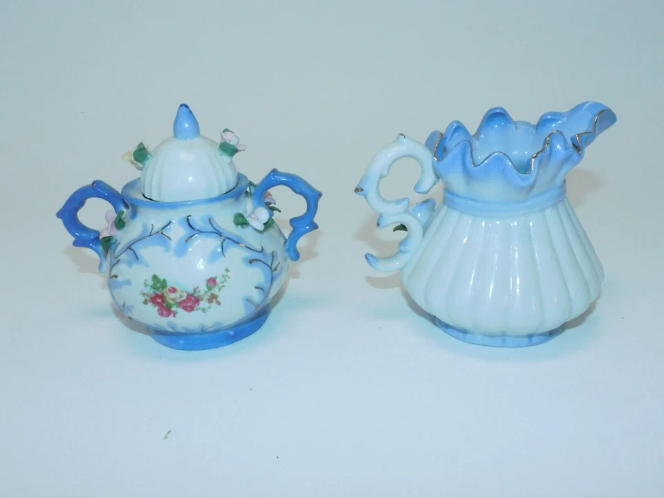 Antiguo azucarero decorativo vintage 1974 pintado a mano y crema con flores. Azul Foto 2 de 4