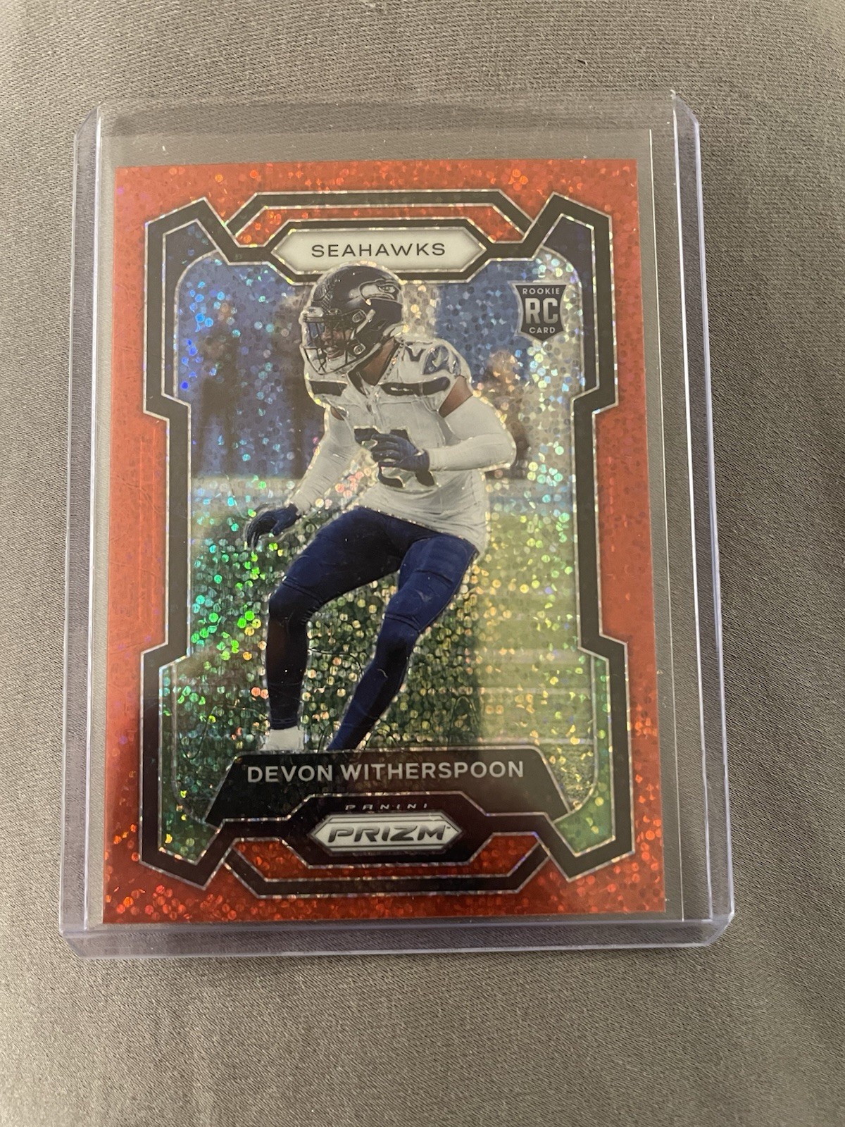 2023 Panini Prizm - Rookies Devon Witherspoon #389 Red Sparkle Prizm (RC)