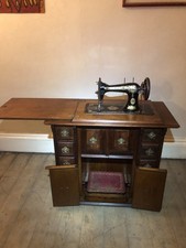 Antique Singer Treadle Sewing Machine In Ornate Cabinet 